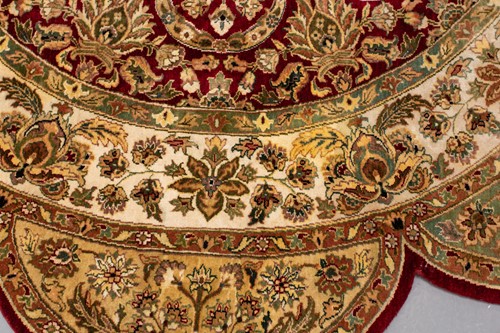 Lot 155 - A possibly Indian lotus-shaped red ground...