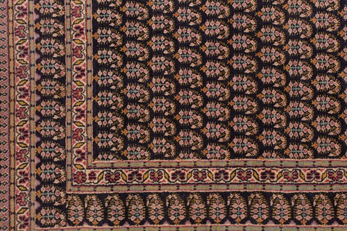Lot 156 - A black ground Senneh rug with an allover...