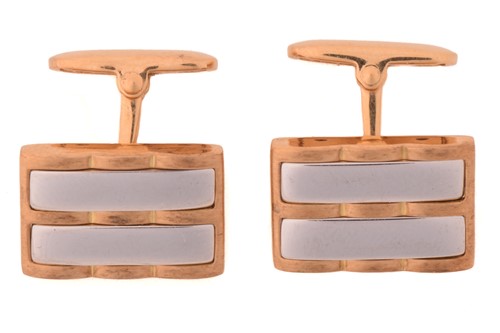 Lot 203 - A pair of geometrical cufflinks, each...