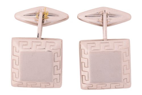 Lot 44 - A pair of square cufflinks, the bevelled head...