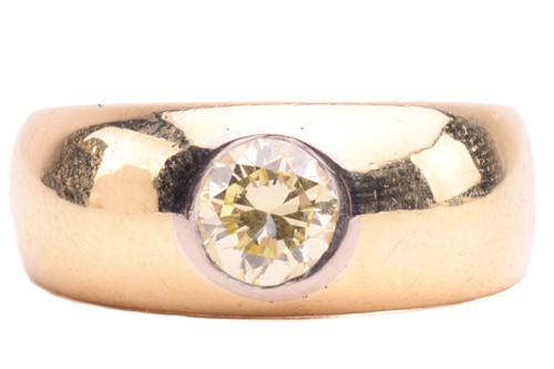 Lot 12 - A diamond gypsy ring, flush-set with a round...