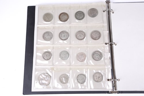Lot 165 - An album containing a collection of coins,...
