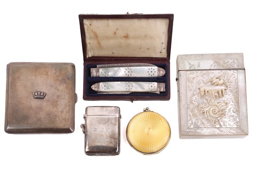 Lot 503 - A carved mother of pearl card case, a silver...