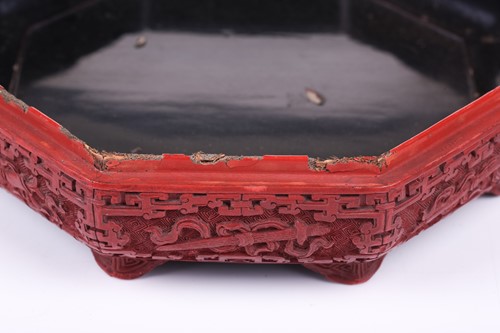 Lot 110 - A Cinnabar lacquer peach shape box, the lid...