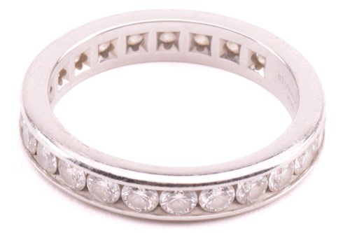Lot 96 - A Tiffany and Co. diamond eternity ring, set...