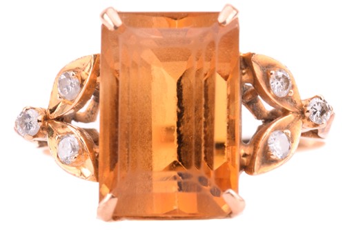 Lot 213 - A citrine and diamond dress ring, containing a...