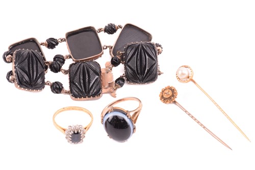 Lot 185 - A jet bracelet, two gem-set rings and two...