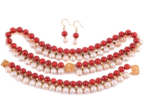 Lot 134 - A cultured pearl and dyed red howlite suite of...