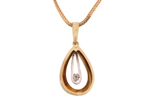Lot 76 - A drop shape pendant set with a cubic zirconia,...
