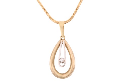 Lot 76 - A drop shape pendant set with a cubic zirconia,...