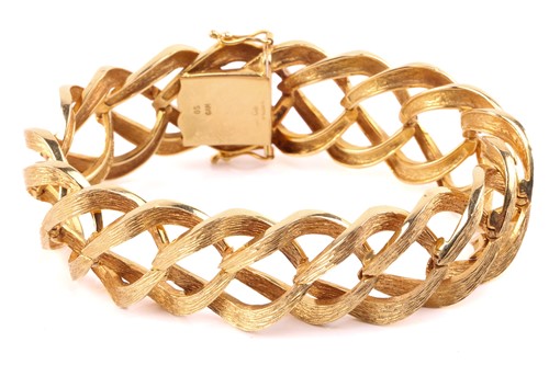 Lot 280 - A mid-century 9ct gold link bracelet; composed...