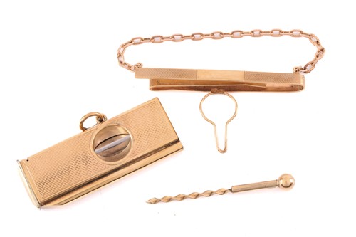 Lot 112 - A 9ct gold cigar cutter with engine turned...