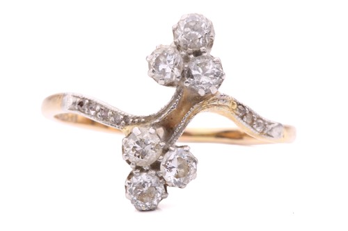 Lot 156 - A diamond trefoil cross-over ring set with...