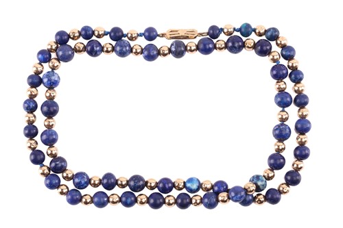 Lot 256 - A beaded necklace with alternate sodalite and...