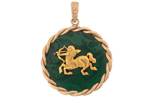 Lot 86 - A malachite zodiac pendant, of circular form,...