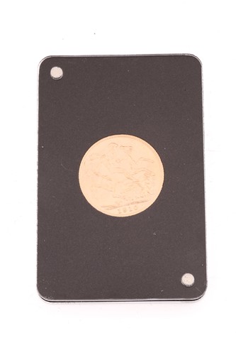 Lot 340 - A 1910 gold Sovereign in a presentation case.