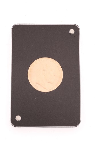 Lot 340 - A 1910 gold Sovereign in a presentation case.