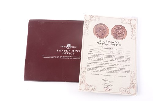 Lot 340 - A 1910 gold Sovereign in a presentation case.