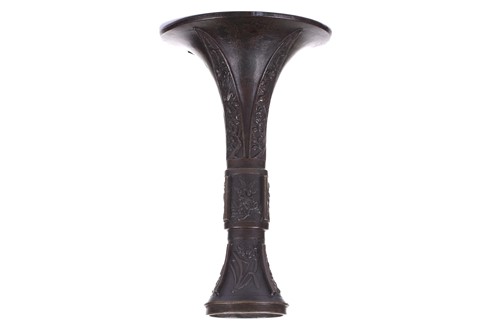 Lot 117 - A Chinese bronze Gu-shaped archaic-style vase,...