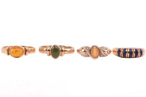 Lot 126 - A lapis five stone ring, set with a row of...