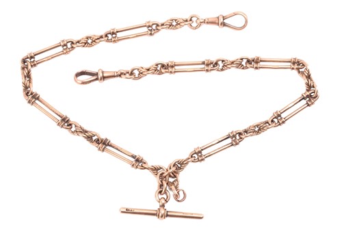 Lot 165 - A 9ct rose gold Albert chain, alternating with...