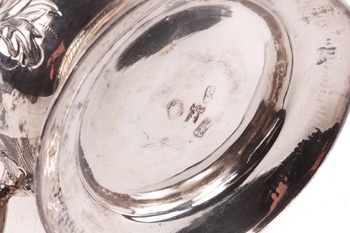 Lot 474 - An 18th century silver mug with later...