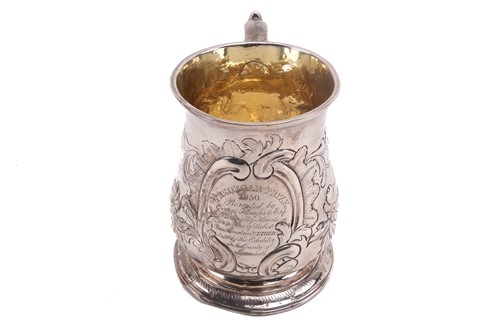 Lot 474 - An 18th century silver mug with later...