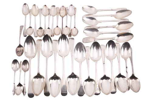 Lot 529 - A collection of varying silver spoons,...