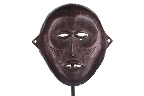 Lot 126 - A Cameroonian monkey skull fetish figure with...