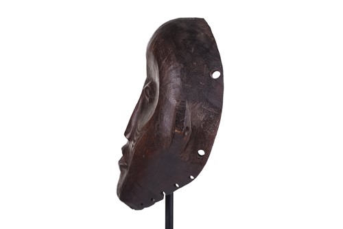 Lot 126 - A Cameroonian monkey skull fetish figure with...