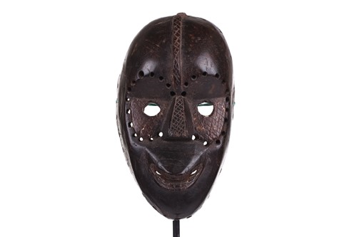 Lot 126 - A Cameroonian monkey skull fetish figure with...
