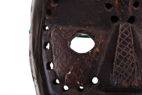 Lot 126 - A Cameroonian monkey skull fetish figure with...