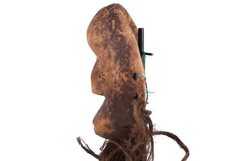 Lot 126 - A Cameroonian monkey skull fetish figure with...