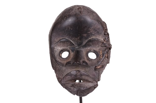 Lot 126 - A Cameroonian monkey skull fetish figure with...