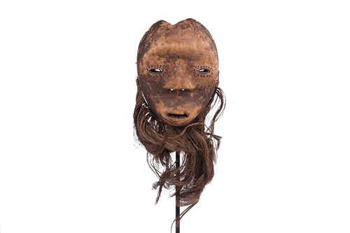Lot 126 - A Cameroonian monkey skull fetish figure with...