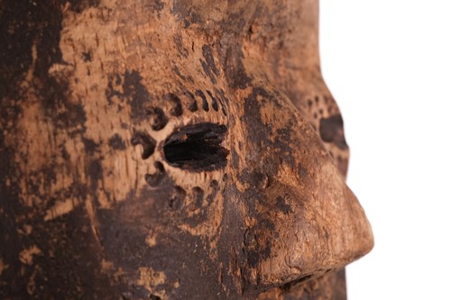 Lot 126 - A Cameroonian monkey skull fetish figure with...