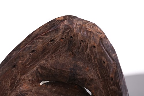 Lot 126 - A Cameroonian monkey skull fetish figure with...