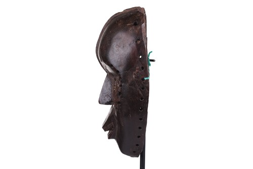 Lot 126 - A Cameroonian monkey skull fetish figure with...