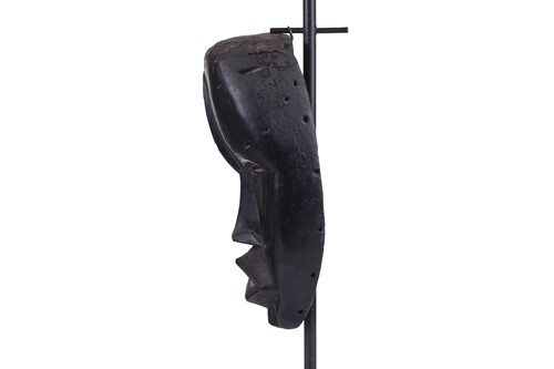 Lot 126 - A Cameroonian monkey skull fetish figure with...