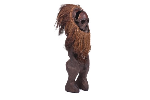 Lot 126 - A Cameroonian monkey skull fetish figure with...