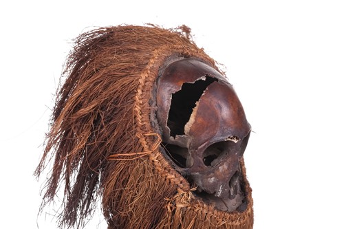 Lot 126 - A Cameroonian monkey skull fetish figure with...