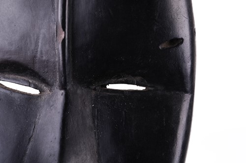Lot 126 - A Cameroonian monkey skull fetish figure with...