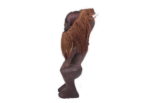 Lot 126 - A Cameroonian monkey skull fetish figure with...