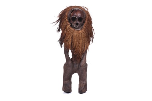 Lot 126 - A Cameroonian monkey skull fetish figure with...