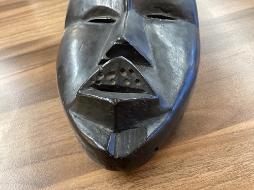 Lot 126 - A Cameroonian monkey skull fetish figure with...