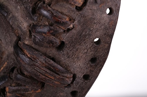 Lot 126 - A Cameroonian monkey skull fetish figure with...