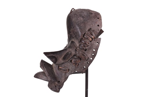 Lot 126 - A Cameroonian monkey skull fetish figure with...