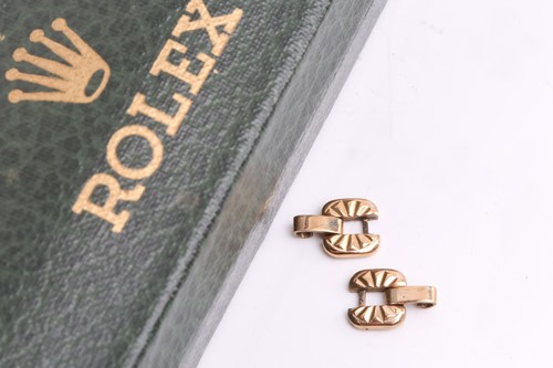 Lot 465 - A Rolex lady's dress watch in 9ct gold,...