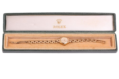 Lot 465 - A Rolex lady's dress watch in 9ct gold,...