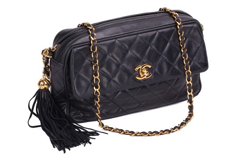 Lot 44 - Chanel - a diamond-quilted camera bag in navy...